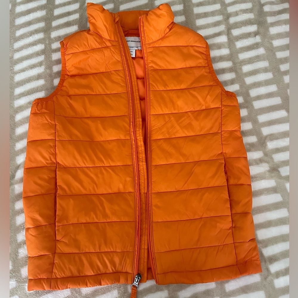 Neon orange puffer vest with zipper